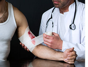 Doctor of Wrapping Laceration with Gauze