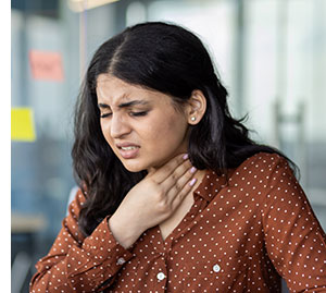 Woman with sore throat.